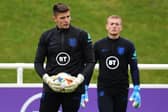 England's goalkeeper Nick Pope (L) and England's goalkeeper Jordan Pickford attend an England team training session at St George's Park in Burton-on-Trent  (Photo by PAUL ELLIS/AFP via Getty Images)