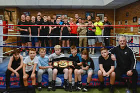 Boxers in the new ring at Horsley Hill ABC with Archie Sharp's champion's belt.