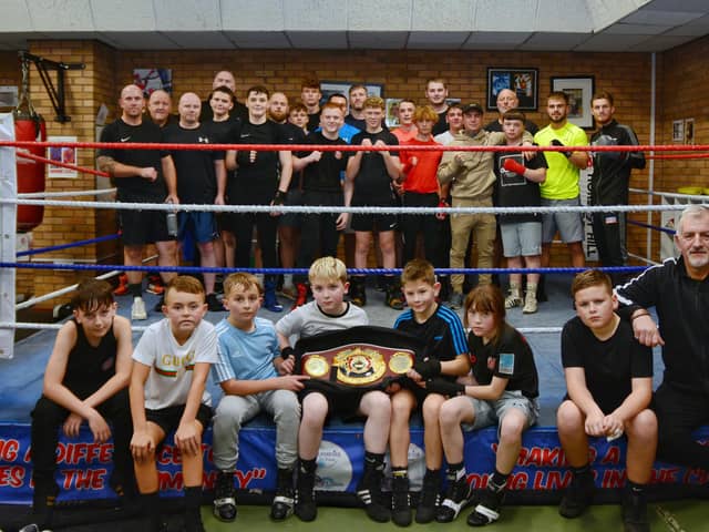 Boxers in the new ring at Horsley Hill ABC with Archie Sharp's champion's belt.