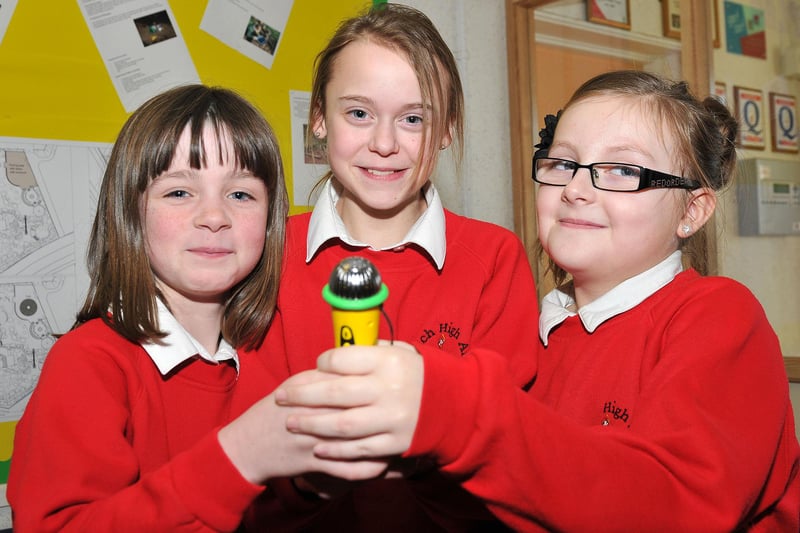 Rossmere Primary School pupils (left to right) Ellie-Jo Dunning, Olivia Hunter and Alex Fletcher were ready to perform a song in 2013. But who can tell us more about the occasion?