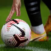 NEWCASTLE UPON TYNE, ENGLAND - OCTOBER 03: Jonjo Shelvey of Newcastle places the ball in the corner during the Premier League match between Newcastle United and Burnley at St. James Park on October 03, 2020 in Newcastle upon Tyne, England. Sporting stadiums around the UK remain under strict restrictions due to the Coronavirus Pandemic as Government social distancing laws prohibit fans inside venues resulting in games being played behind closed doors. (Photo by Alex Pantling/Getty Images)