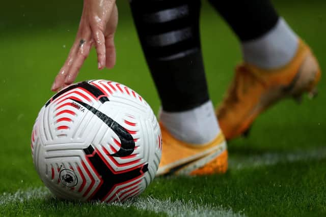 NEWCASTLE UPON TYNE, ENGLAND - OCTOBER 03: Jonjo Shelvey of Newcastle places the ball in the corner during the Premier League match between Newcastle United and Burnley at St. James Park on October 03, 2020 in Newcastle upon Tyne, England. Sporting stadiums around the UK remain under strict restrictions due to the Coronavirus Pandemic as Government social distancing laws prohibit fans inside venues resulting in games being played behind closed doors. (Photo by Alex Pantling/Getty Images)