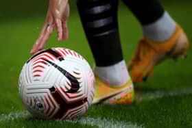 NEWCASTLE UPON TYNE, ENGLAND - OCTOBER 03: Jonjo Shelvey of Newcastle places the ball in the corner during the Premier League match between Newcastle United and Burnley at St. James Park on October 03, 2020 in Newcastle upon Tyne, England. Sporting stadiums around the UK remain under strict restrictions due to the Coronavirus Pandemic as Government social distancing laws prohibit fans inside venues resulting in games being played behind closed doors. (Photo by Alex Pantling/Getty Images)