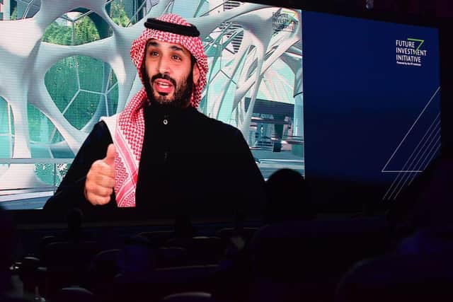 Saudi Crown Prince Mohammed bin Salman speaks during the Future Investment Initiative (FII) conference in a virtual session in the capital Riyadh, on January 28, 2021. - Salman said today that the kingdom will sell more shares of energy giant Aramco in the coming years, following the world's biggest public listing in 2019. (Photo by Fayez Nureldine / AFP) (Photo by FAYEZ NURELDINE/AFP via Getty Images)