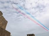 The Red Arrows fly over Carrickfergus Castle in 2021. Picture by Matt Mackey / Press Eye.