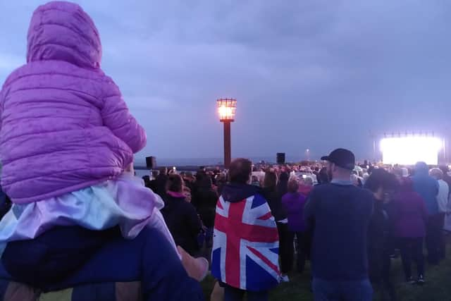 The beacon alight on the Lawe Top.