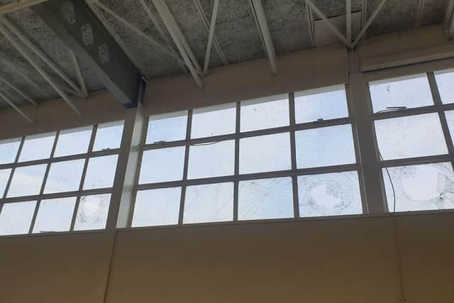 Broken windows at Chuter Ede Community Centre