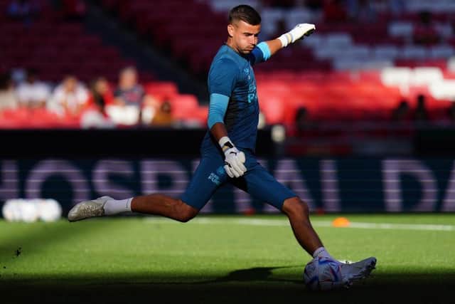 Karl Darlow of Newcastle United FC in action during the warm up before the start of the Eusebio Cup match between SL Benfica and Newcastle United at Estadio da Luz on July 26, 2022 in Lisbon, Portugal.  (Photo by Gualter Fatia/Getty Images)