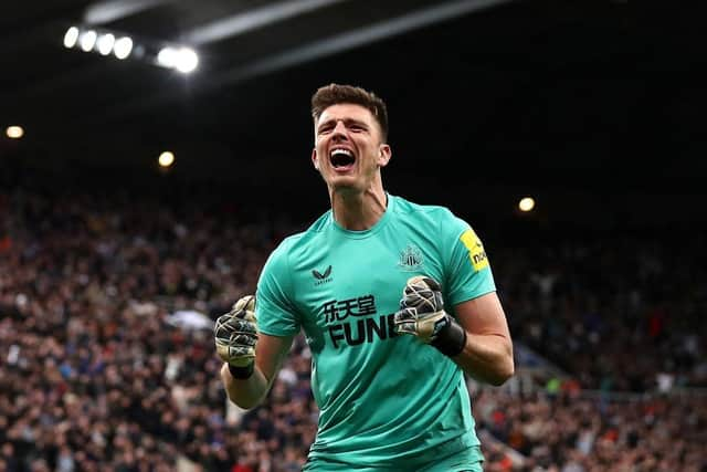 Newcastle United goalkeeper Nick Pope celebrates the win.