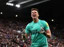 Newcastle United goalkeeper Nick Pope celebrates the win.