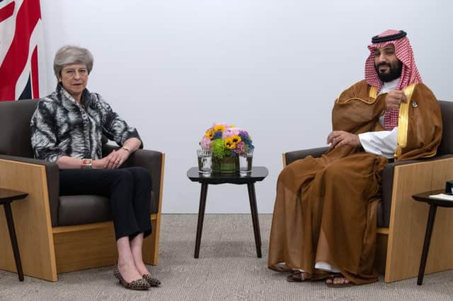 OSAKA, JAPAN - JUNE 29: Britain's Prime Minister, Theresa May, meets the Crown Prince of Saudi Arabia, Mohammad Bin Salman, during a bilateral meeting on June 29, 2019 in Osaka, Japan. World leaders have been meeting in Osaka for the annual Group of 20 summit to discuss economic, environmental and geopolitical issues. The US-China trade war has dominated the agenda with U.S President Trump and China's President Xi Jinping scheduled to meet on Saturday for an extended bilateral in an attempt to resolve the ongoing the trade war between the world's two largest economies. (Photo by Carl Court/Getty Images)