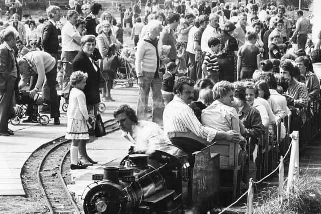 Keith drives a packed train in this scene from 1980.