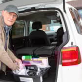 Sats Squad volunteer Chas Buchanan tidying his kit for the last time.