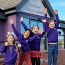 Happy pupils celebrate the Ofsted result.