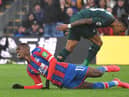 Newcastle United's Austrian midfielder Valentino Lazaro (L) fouls Crystal Palace's Ivorian striker Wilfried Zaha during the English Premier League football match between Crystal Palace and Newcastle United at Selhurst Park in south London on February 22, 2020.