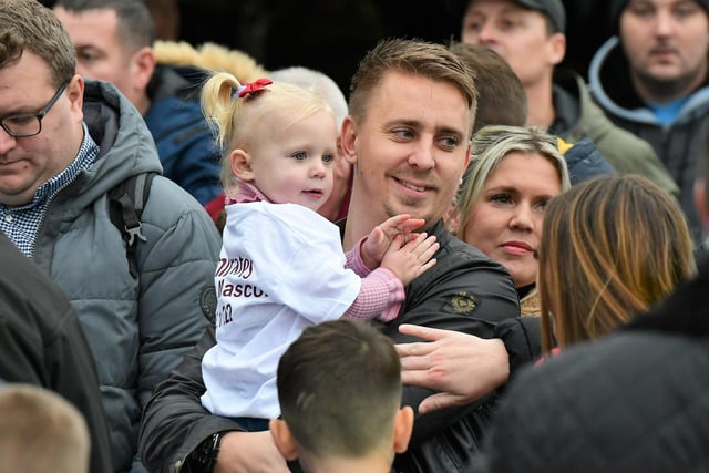 A young supporter ready to put her hands together for her team. Picture: Kev Wilson.