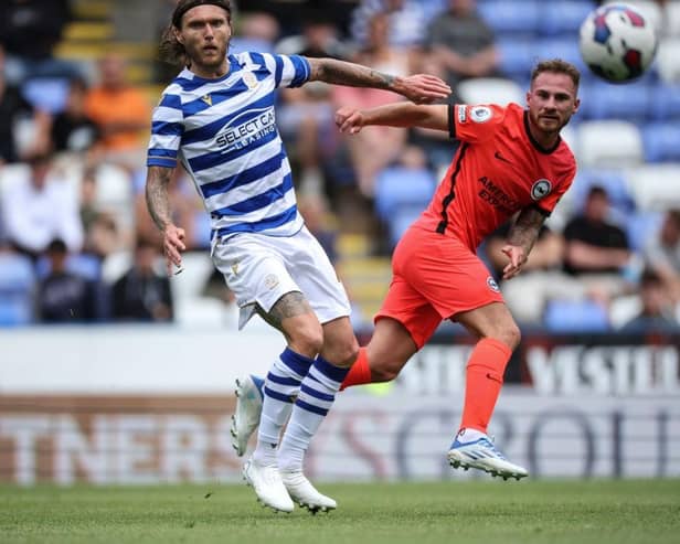 Alexis Mac Allister of Brighton and Hove Albion is challenged by Jeff Hendrick of Reading at the Select Car Leasing Stadium on July 23, 2022 in Reading, England. (Photo by Eddie Keogh/Getty Images)