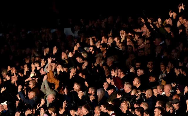Football fans. (Photo by Nathan Stirk/Getty Images)