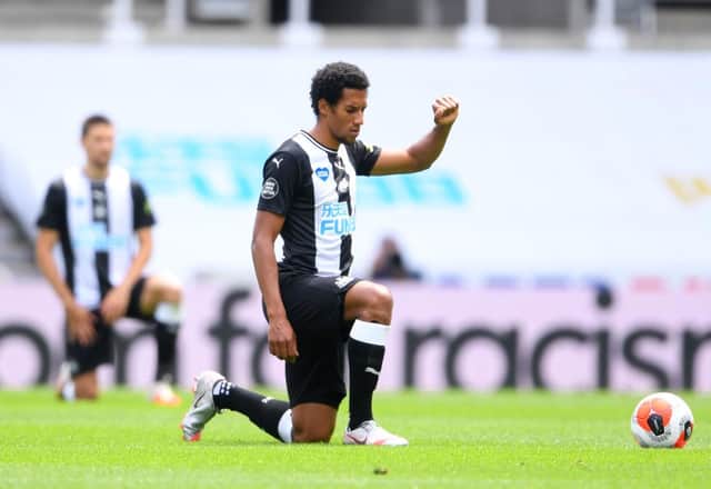 Isaac Hayden takes the knee for Newcastle United