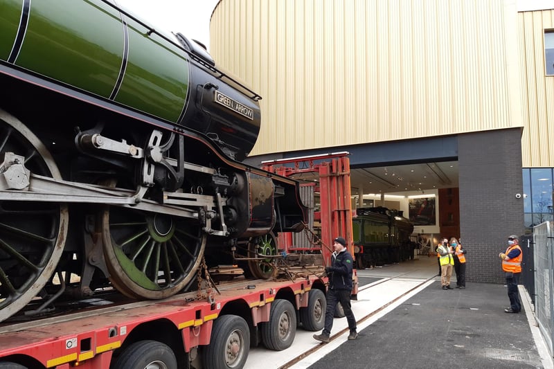 Final preparations to take Green Arrow off the lorry at Doncaster museum