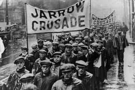 1936:  Protest marchers on the Jarrow Crusade, a demonstration march by unemployed men from shipyard town of Jarrow, Tyneside, who walked to London to demand the right to work.  (Photo by Keystone/Getty Images)