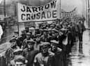 1936:  Protest marchers on the Jarrow Crusade, a demonstration march by unemployed men from shipyard town of Jarrow, Tyneside, who walked to London to demand the right to work.  (Photo by Keystone/Getty Images)