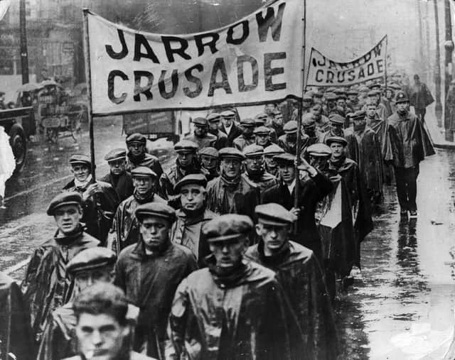1936: Protest marchers on the Jarrow Crusade, a demonstration march by unemployed men from shipyard town of Jarrow, Tyneside, who walked to London to demand the right to work. (Photo by Keystone/Getty Images)