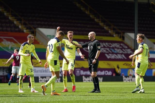 Newcastle United were controversially denied a penalty against Burnley following James Tarkowski's high boot on Sean Longstaff. (Photo by JON SUPER/POOL/AFP via Getty Images)