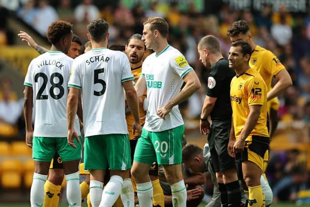 Fabian Schar was only awarded a yellow card by referee Peter Bankes for his tackle on Pedro Neto (Photo by David Rogers/Getty Images)