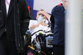 Christian Eriksen is taken to hospital after receiving CPR on the pitch.