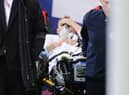Christian Eriksen is taken to hospital after receiving CPR on the pitch.
