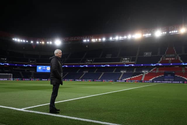 PARIS, FRANCE - MARCH 11: (FREE FOR EDITORIAL USE) In this handout image provided by UEFA, Lucien Favre, Head Coach of Borussia Dortmund looks at the pitch prior to the UEFA Champions League round of 16 second leg match between Paris Saint-Germain and Borussia Dortmund at Parc des Princes on March 11, 2020 in Paris, France. The match is played behind closed doors as a precaution against the spread of COVID-19 (Coronavirus).  (Photo by UEFA - Handout/UEFA via Getty Images)