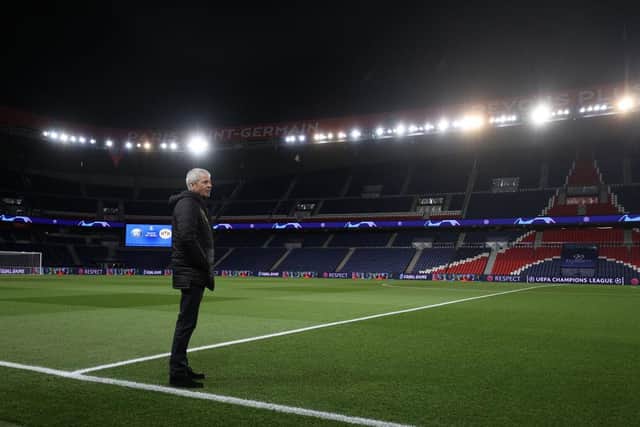 PARIS, FRANCE - MARCH 11: (FREE FOR EDITORIAL USE) In this handout image provided by UEFA, Lucien Favre, Head Coach of Borussia Dortmund looks at the pitch prior to the UEFA Champions League round of 16 second leg match between Paris Saint-Germain and Borussia Dortmund at Parc des Princes on March 11, 2020 in Paris, France. The match is played behind closed doors as a precaution against the spread of COVID-19 (Coronavirus). (Photo by UEFA - Handout/UEFA via Getty Images)