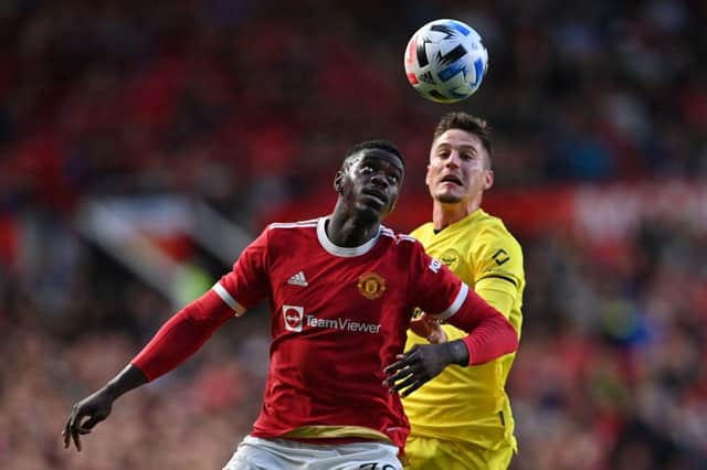 Axel Tuanzebe playing for Manchester United last month.