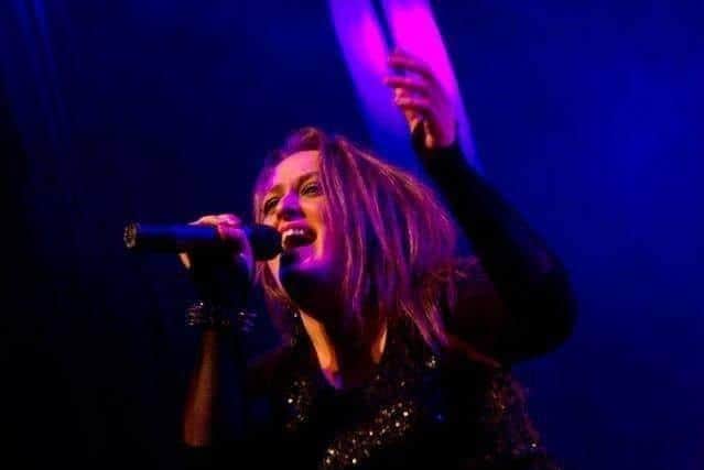 Brooke Barber performing