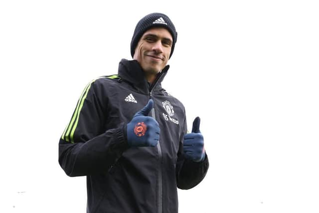 Raphael Varane of Manchester United walks out to a Manchester United first team training session at Carrington Training Ground ahead of their UEFA Europa League round of 16 leg two match against Real Betis on March 15, 2023 in Manchester, England. (Photo by Matthew Peters/Manchester United via Getty Images)