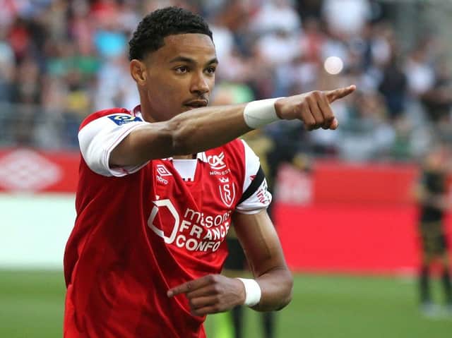 Reims' forward Hugo Ekitike celebrates after scoring a goal during the French L1 football match between Stade de Reims and OGC Nice at Stade Auguste-Delaune in Reims, northern France on May 21, 2022. (Photo by FRANCOIS NASCIMBENI / AFP) (Photo by FRANCOIS NASCIMBENI/AFP via Getty Images)