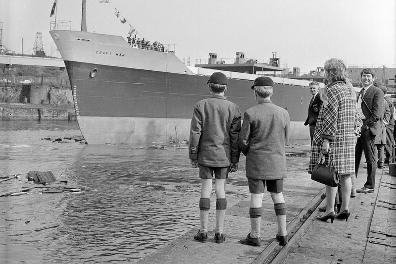 Standing on the quayside as Doxford and Sunderland Ltd launched the 12,425 ton cargo liner Craftsman from their Deptford yard.