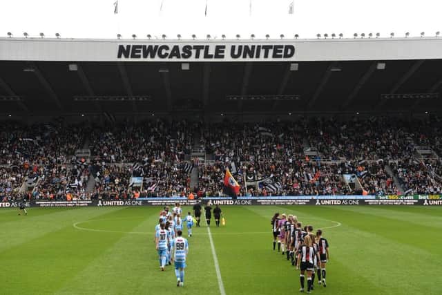 The two teams enter the field to a packed East Stand, part of a 22,000 crowd before the FA Women's National League Division One North match between Newcastle United Women and Alnwick Town Ladies at St James' Park on May 01, 2022 in Newcastle upon Tyne, England. (Photo by Stu Forster/Getty Images)