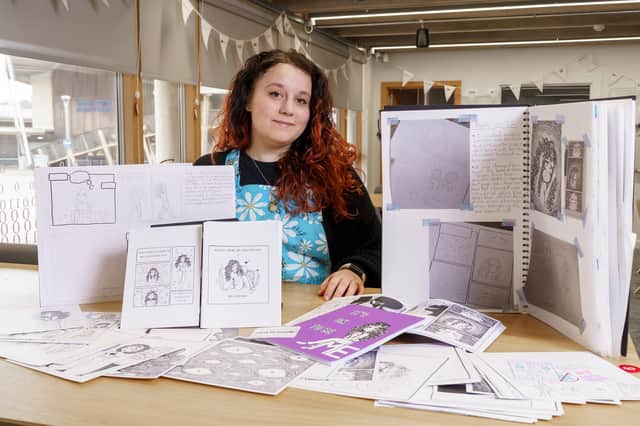 Lauren with some of her artwork
