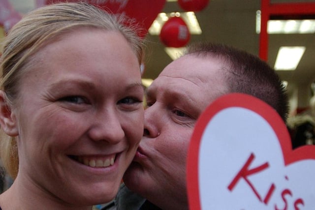 British Heart Foundation manager Lesley McBryde gets a sneaky kiss from customer Billy Amer during a charity event in 2004. Remember this?