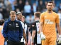 Newcastle United's English head coach Eddie Howe (L) and Newcastle United's Slovakian goalkeeper Martin Dubravka (R) leave the pitch after the English Premier League football match between Manchester City and Newcastle United at the Etihad Stadium in Manchester, north west England, on May 8, 2022. (Photo by PAUL ELLIS/AFP via Getty Images)