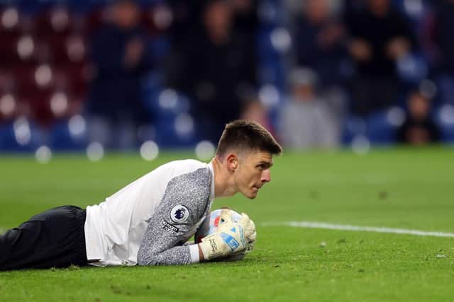 Nick Pope of Burnley makes a save during the Premier League match between Burnley and Southampton at Turf Moor on April 21, 2022 in Burnley, England. (Photo by Catherine Ivill/Getty Images)