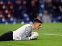Nick Pope of Burnley makes a save during the Premier League match between Burnley and Southampton at Turf Moor on April 21, 2022 in Burnley, England. (Photo by Catherine Ivill/Getty Images)