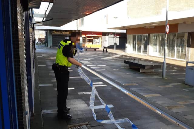 Police at the scene of the alleged assault in St John's Precinct, Hebburn.