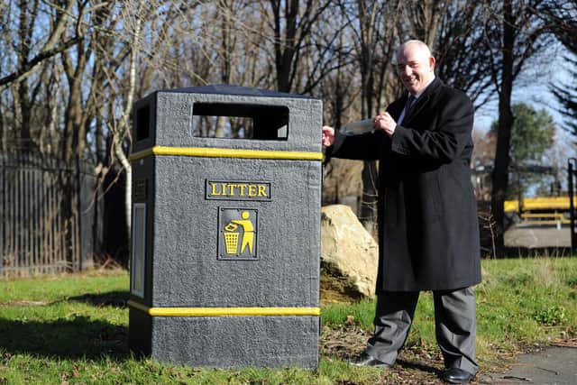South Tyneside Council Cllr Ernest Gibson with one of the new bins being installed throughout the borough.