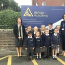 Zoe Carr, chief executive officer of WISE Academies (left) and Ashley Academy headteacher Denise Todd alongside children in their new school uniform.