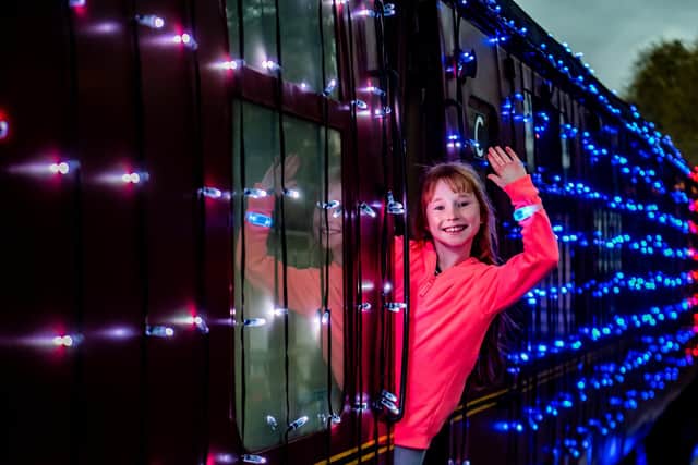 Pictured Freya Hardisty, aged 9, preparing to board the train at Pickering Station.
