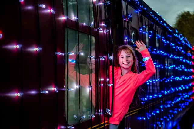 Pictured Freya Hardisty, aged 9, preparing to board the train at Pickering Station.