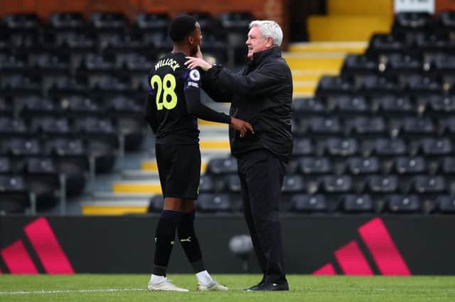 Steve Bruce embraces Joe Willock at the final whistle.
